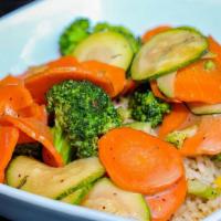 Carrot, Zucchini And Brocolli Stir-Fry · Sauteed with a roasted garlic balsamic served over brown rice. Gluten free. Vegetarian.