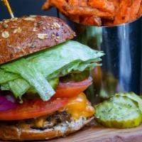 Grass Fed Angus Burger · Farm-raised Angus beef burger perfectly grilled to the temperature of your liking and topped...