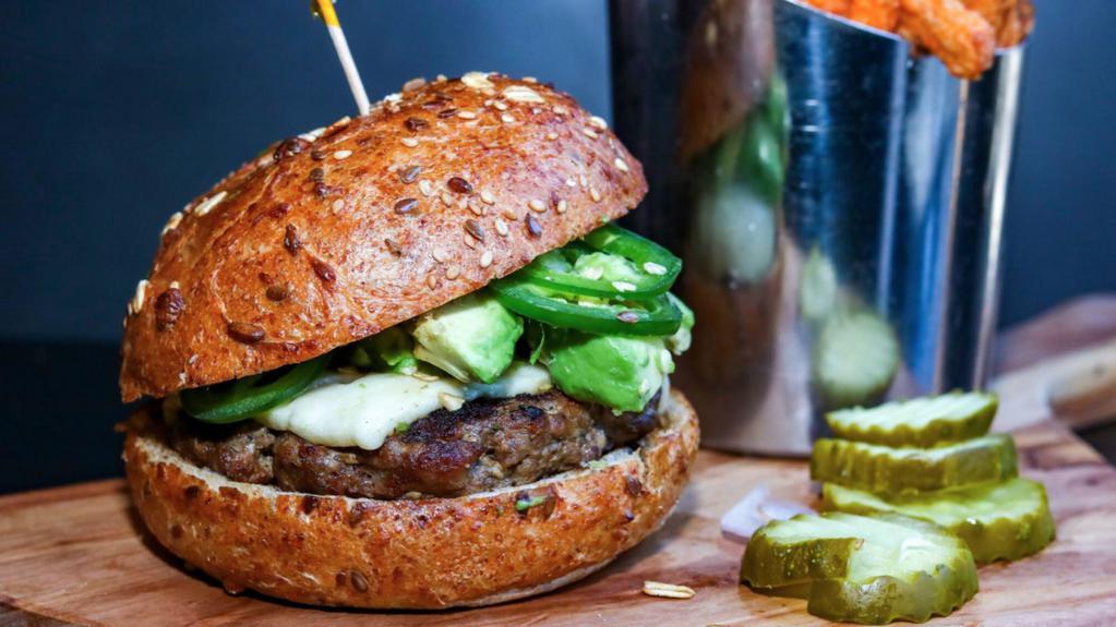 Organic Cinco De Mayo Burger · Ole!!! Fossil farms signature chipotle bison burger perfectly grilled to the temperature of your liking and topped with queso fresco, avocado and jalapenos.