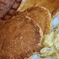 Sweet Potato Pancakes · Southern-style golden sweet potato pancakes grilled and served with 3 egg whites and lean tu...
