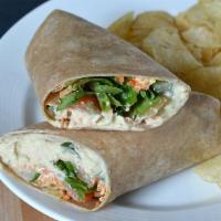 Hummus Wrap · Classic hummus, roasted red peppers, arugula, tomato, cucumber, on whole wheat wrap served w...
