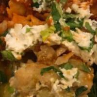 Taquitos · Vegetarian. Mashed potato in corn tortillas with salsa verde, salsa roja, queso fresco, and ...