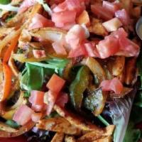 Ensalada De Pollo · Gluten-free. Grilled chicken breast, peppers, onion, and tomato, mesclun with jalapeño lime ...