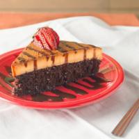 Postal Impossible · Rich chocolate cake and vanilla flan with chocolate syrup.