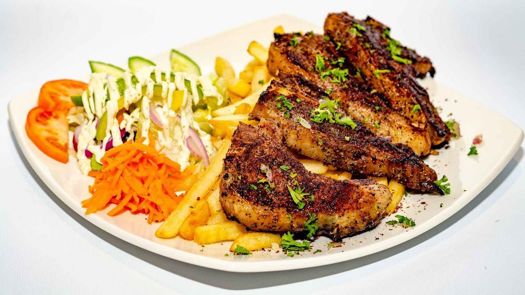 Lamb Chops (6 Pc) · Marinated with a spicy rub and grilled.