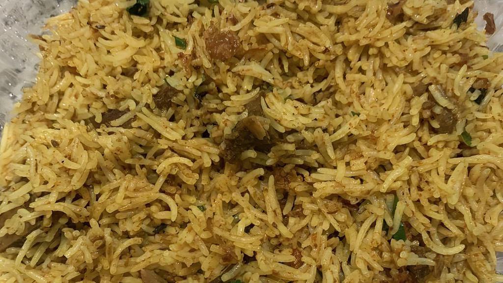 Goat Biryani · Basmati rice cooked with chicken, spices and special herbs.