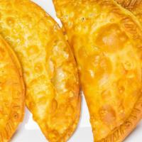 Beef Empanadas-Empanada De Carne · Seasoned ground beef slowed cook with one of a kind sofrito, deep fried for perfection.