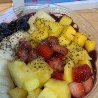 The Classic Açaí Bowl · Base
Organic Açaí Berry Blended Thick With Strawberry & Banana & Blue Berry

Topping
Organic...