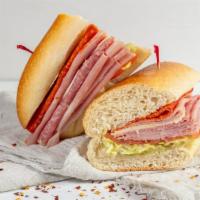 Italian Hero Sandwich · Boiled Ham, Genoa Salami, Hot Ham,
Pepperoni & Provolone with Lettuce, Tomato, Onion & Oil &...