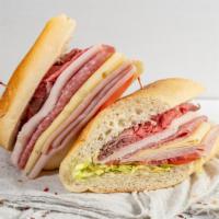 German Hero Sandwich · Roast Beef, Turkey, Hard Salami,
Honey Ham & Swiss with Lettuce, Tomato,
Onion & Horseradish...