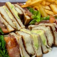 Grilled Chicken & Avocado Club · Grilled chicken breast with avocado, Swiss cheese, bacon, lettuce & tomato between three sli...