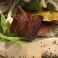 The Mega Blt Sandwich · Classic BLT sandwich with double the crispy bacon or turkey bacon, lettuce, tomato slices, a...