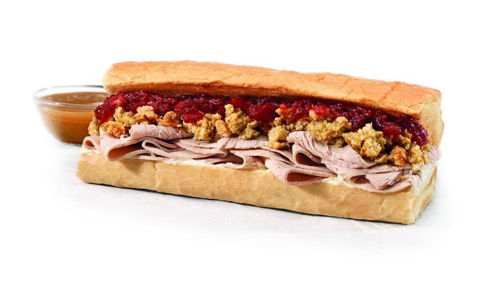 Thanksgiving Toasted (Small) · Hand-sliced Turkey Breast, Stuffing, Cranberry Sauce & Mayo, served with a side of Hot Gravy, toasted to perfection.