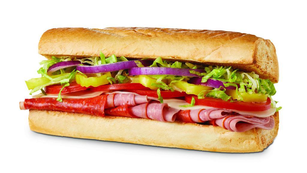 Italian (Large) · Pepperoni, Capicola, Genoa Salami, Mortadella & Provolone Cheese, topped with Lettuce, Tomato, Banana Peppers, Red Onions, Oil & Vinegar. Your choice of fresh garnishes can be added.