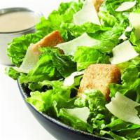 Caesar Salad · Crisp Romaine Lettuce, shredded Parmesan Cheese, Home-Style Croutons and our Creamy Caesar D...
