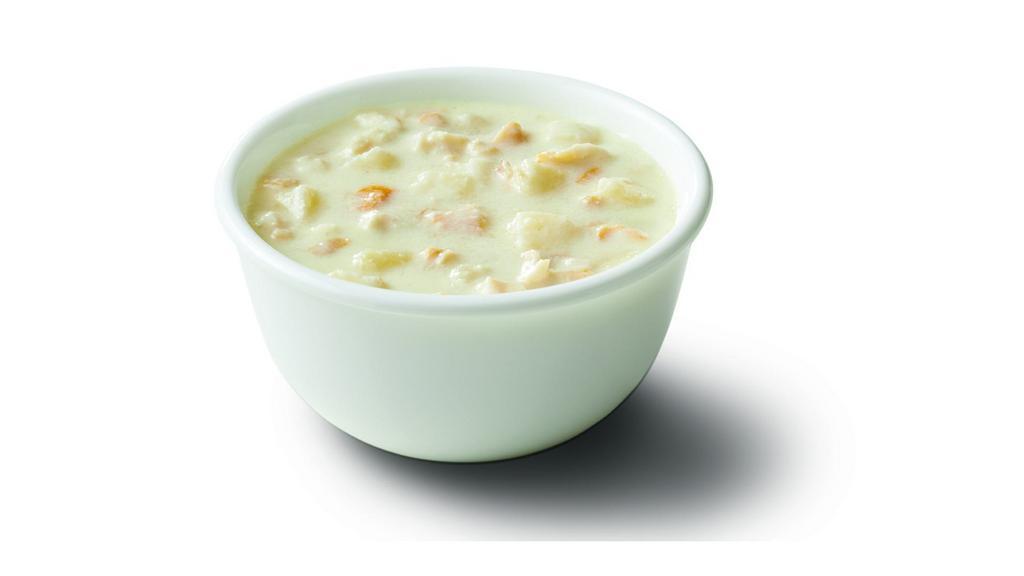 New England Clam Chowder · Authentic New England Clam Chowder, thick and rich, made with sweet cream and flavorful clam broth, loaded with tender chunks of clams, potatoes, and spices.