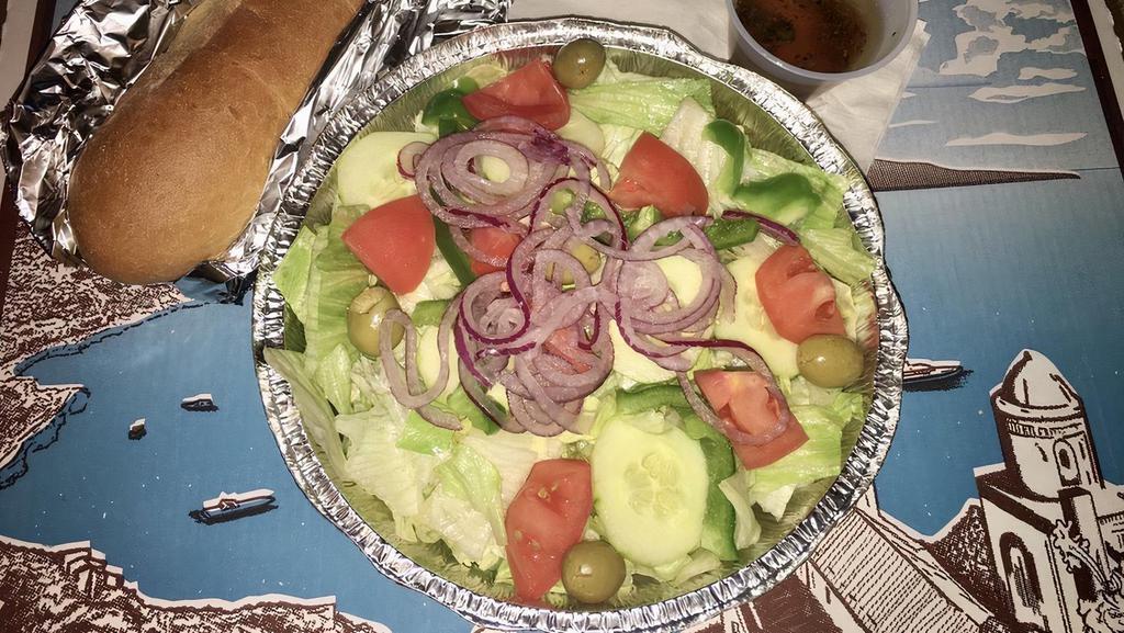 Tossed Salad · Lettuce, tomatoes, onions, cucumbers, olives, peppers.