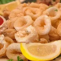 Fried Calamari · Tenderly fried, served over a black pepper biscuit with Vincent's 