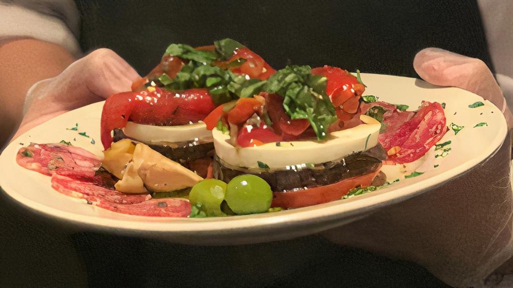 Vincent'S Cold Antipasto · homemade mozzarella, roasted red peppers, grilled eggplant, soppressata, grilled artichokes, and olives drizzled in EVOO