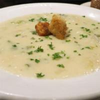 New England Clam Chowder (Pint) · Thick and creamy clam soup with vegetables and potatoes loaded with clams
