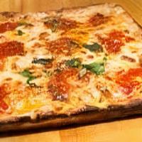 Grandma Pizza · Vincent's marinara sauce, shredded mozzarella, olive oil and freshly chopped basil
