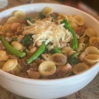 Orecchiette Broccoli Rabe W/Sausage · served with crumbled sausage and cannellini beans in a light garlic sauce