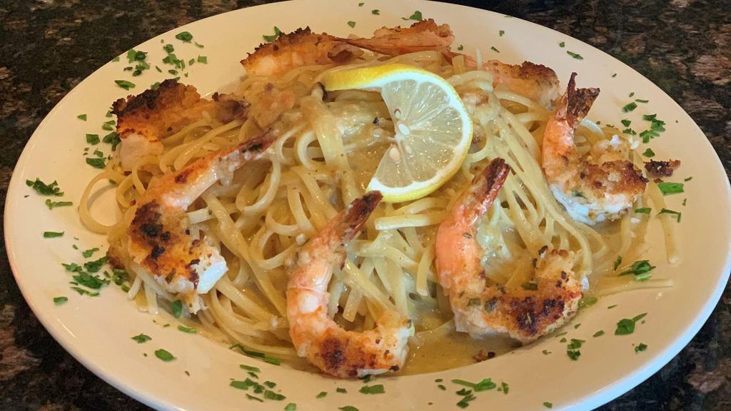 Shrimp Scampi Oreganato · Broiled in garlic, lemon and breadcrumbs, served with pasta