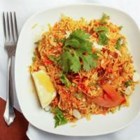 Muglai Biryani Chicken · Aromatic indian basmati cooked with fresh herbs nuts and spices with chicken. Served with ra...