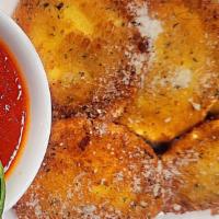 Fried Ravioli W/ (Marinara Or Vodka Sauce) · Five pieces of cheese ravioli coated in seasoned breadcrumbs and fried to golden brown perfe...