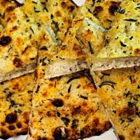 Flat Bread (Home Made) · Fresh made to order, Flat bread with Rosemary & Special Ungaro Seasonings baked in our Coal ...