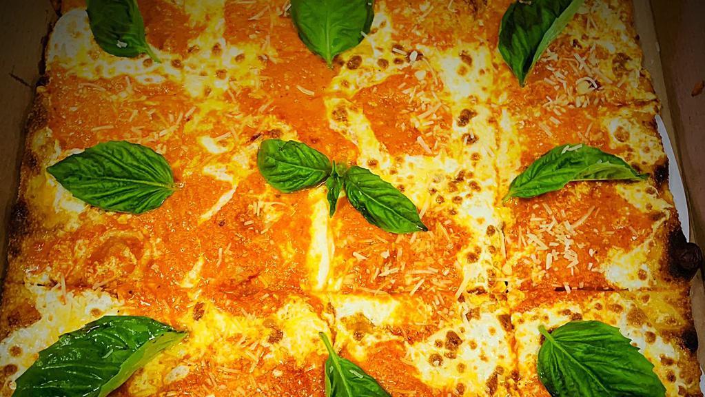 Old Fashioned Grandpa Square · Thin Crust Sicilian Pizza with Fresh Mozzarella, our homemade Vodka Sauce, finished off with Parmigiano Reggiano cheese & Fresh Basil.