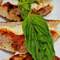 Meatball Parmigiana Panini · Our Fresh meatballs smothered in marinara sauce with melted fresh mozzarella and grated parm...