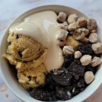 Cookie Dough Oreo · Original Dough Mixed with Chocolate Chunks Topped with Cookie Dough Bites, Oreos and Vanilla...