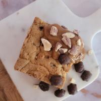 Blondie Bombshell · Warm Blondie With Milk Chocolate Caramel Turtles Drizzled With Caramel And Topped With Diced...