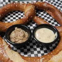 *Giant Pretzel · baked fresh, served with housemade queso, brown mustard