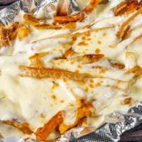 Ranch Fries · Fries with ranch and mozzarella cheese.