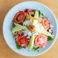 Large Mediterranean Salad · Fresh lettuce, shredded carrots, and red cabbage topped with feta cheese, cucumbers, and tom...