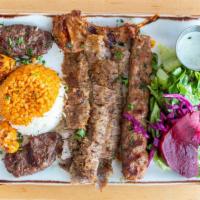 Mixed Grill · An assortment of adana kebab, kofte kebab, doner (gyro) kebab, lamb chops, and chicken shish...