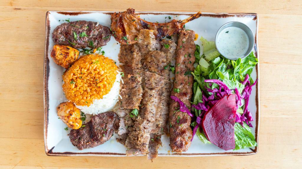 Mixed Grill · An assortment of adana kebab, kofte kebab, doner (gyro) kebab, lamb chops, and chicken shish kebab.
