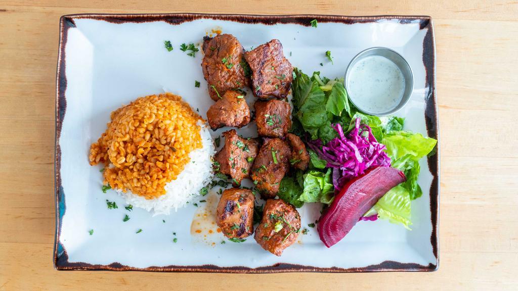 Lamb Shish Kebab · Specially marinated cubes of baby lamb grilled on skewers.