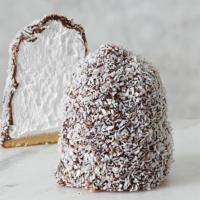 Coconut Marshmallow Puff · Whipped marshmallow, dark chocolate, shredded coconut, marzipan base