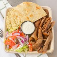 Classic Gyro · with Lettuce, Tomato, Onion & Tzatziki in Warm Pita