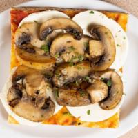 Pie Crispino Mushroom · Thin crust topped with fresh mozzarella and sautéed mushrooms.