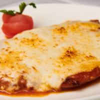 Chicken Parmigiana · Tomato sauce, fresh mozzarella.