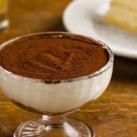 Frankies Tiramisu · Lady fingers dipped in a coffee-rum mixture and layered with mascarpone cream. Dusted with c...