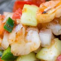 Chuchaqui Shrimp Ceviche · Shrimp marinated in a citrus lime and tomato with red onions cilantro and avocado ( option: ...