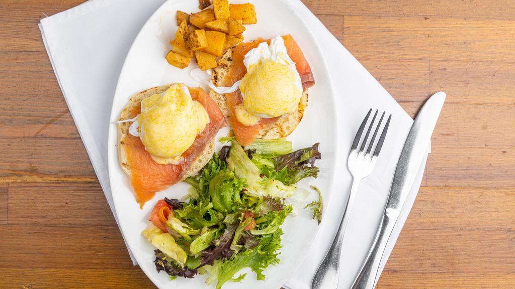 Eggs Benedict Salami · Eggs benedict made with English muffin topped with hollandaise sauce and served with house salad.