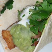 Fish Tacos (3) · Three soft tortillas filled with blackened cod, pico de gallo, guacamole, & shredded cabbage...