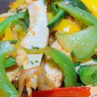 Sizzling Fajitas · Onions, bell peppers, poblano peppers, garlic, cilantro.