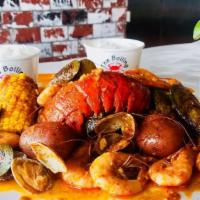 Lobster Tail Combo · All Combos come with: 1/2 pound of Shrimp, 1/2 pound clams, 1/2 pound mussels 2 corn, 3 pota...